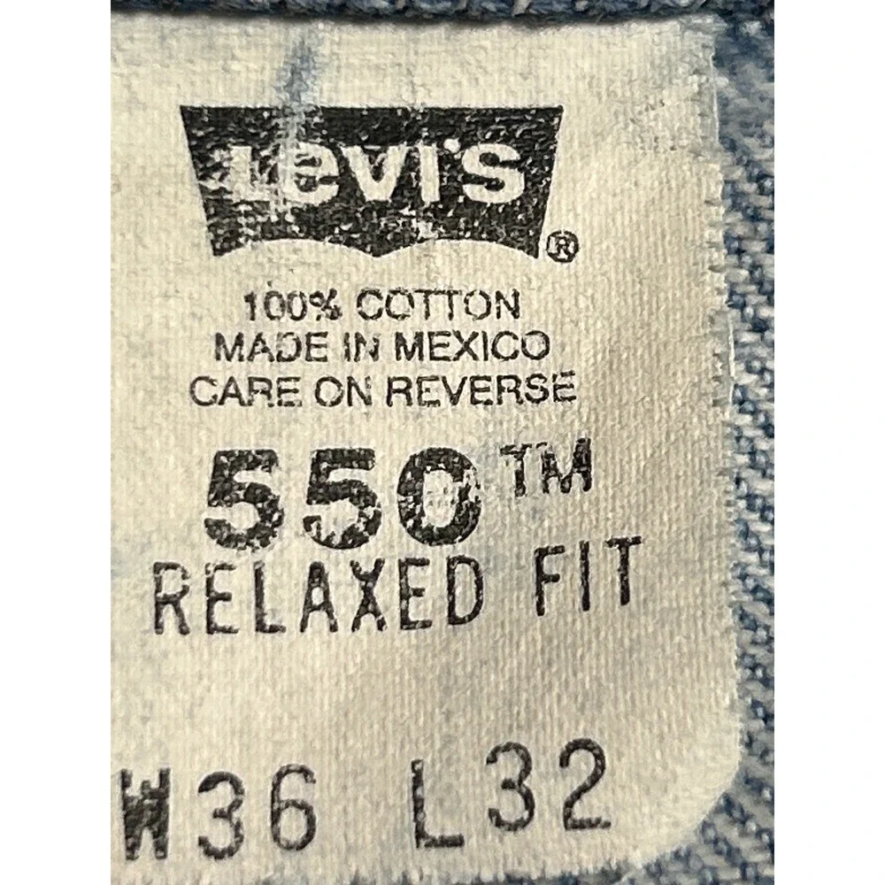 Vintage Levis 550 Mens Relaxed Fit Cut Off Frayed Hem Light Wash Jeans 36x28